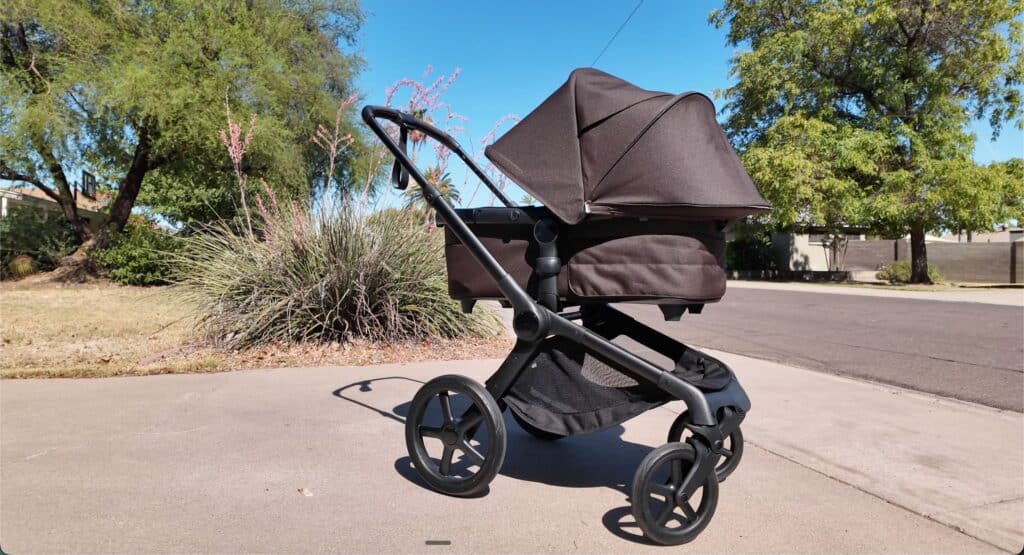 A Bugaboo Fox 5 stroller in a driveway